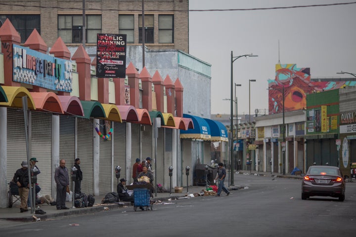 Homeless people on a Skid Row sidewalk in Los Angeles, California. The 2017 Greater Los Angeles Homeless Count indicates a 20