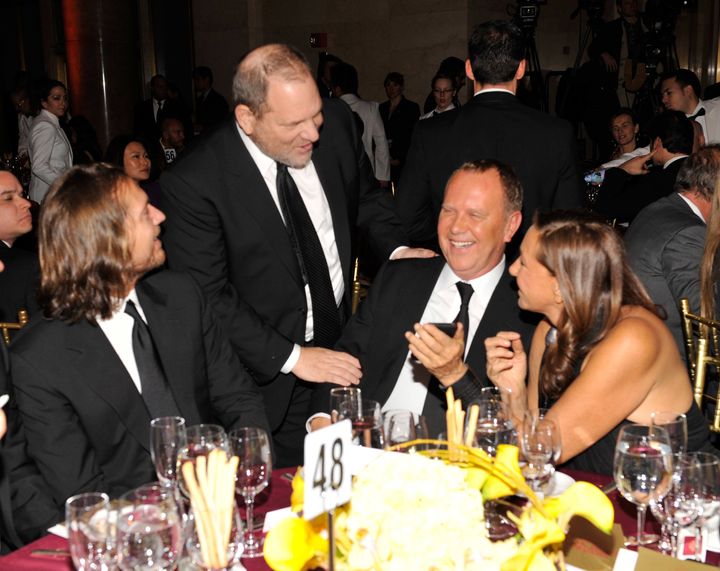 Harvey Weinstein, Michael Kors and Donna Karan at the amfAR gala in 2011. 