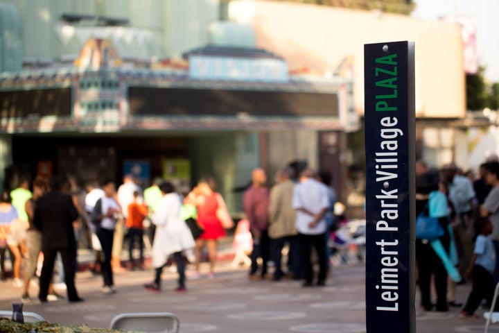 Celebrating the inaugural book launch of Harriet Tubman Press and the 20th Anniversary of TSEHAI Publishers at Leimert Park Village Plaza in front of the The Vision Theatre 