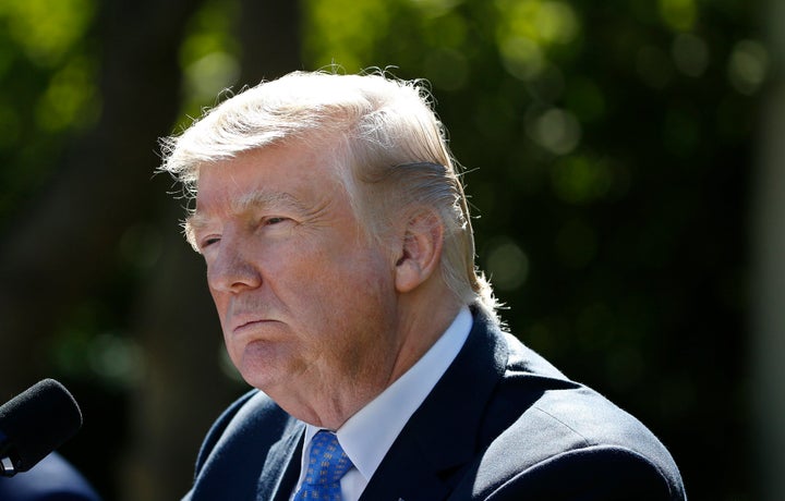 President Donald Trump listens to a question during a joint news conference with Greek Prime Minister Alexis Tsipras in the R