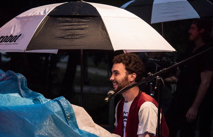 Under one big umbrella as the concert shoot concludes, it won’t rain on drummer Michael Dause’s parade. 