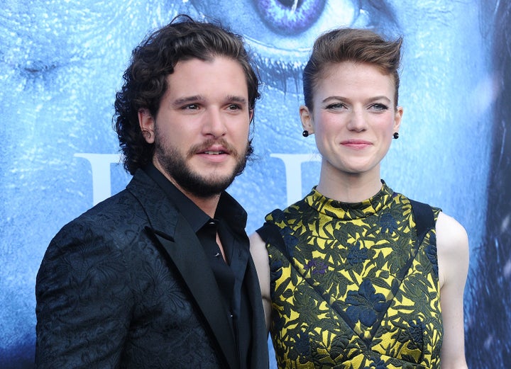 Kit Harington, left, said it was "really embarrassing" to wear his "Game of Thrones" character Jon Snow's costume to a party, after being forced into it by his future wife Rose Leslie, right.