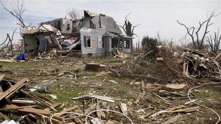 <p>Residents of Fairdale, Illinois, took a direct hit from a tornado, which left this home devastated. Insurance officials warn disaster victims not to fall for home repair scams, and in some states, they post online “Most Wanted” lists of alleged fraudsters.</p>