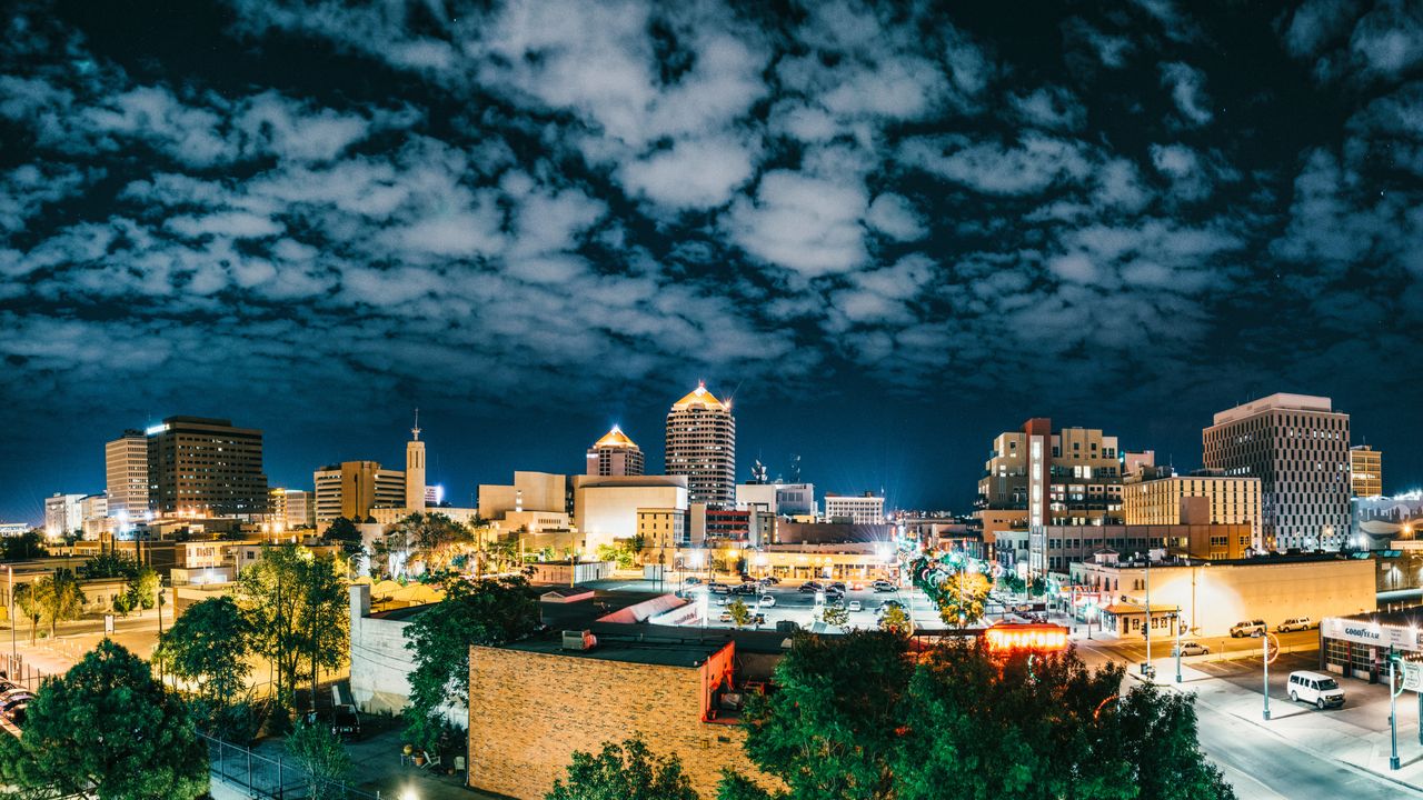 Downtown Albuquerque at night. The most recent federal monitor's report found APD to be 47 percent in operational compliance with the consent decree. For a judge to consider lifting the decree, it must be 95 percent for two years.