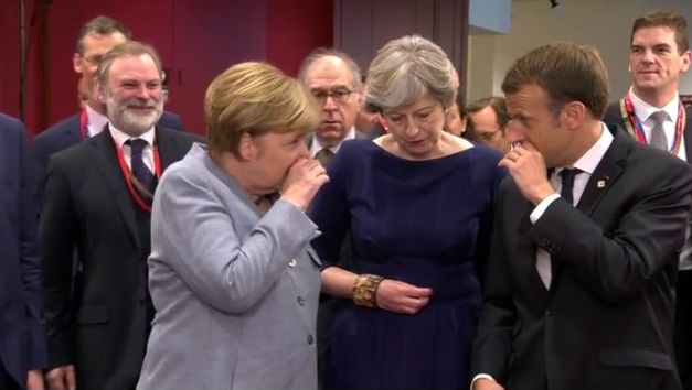 Theresa May with Angela Merkel and Emmanuel Macron in Brussels today 