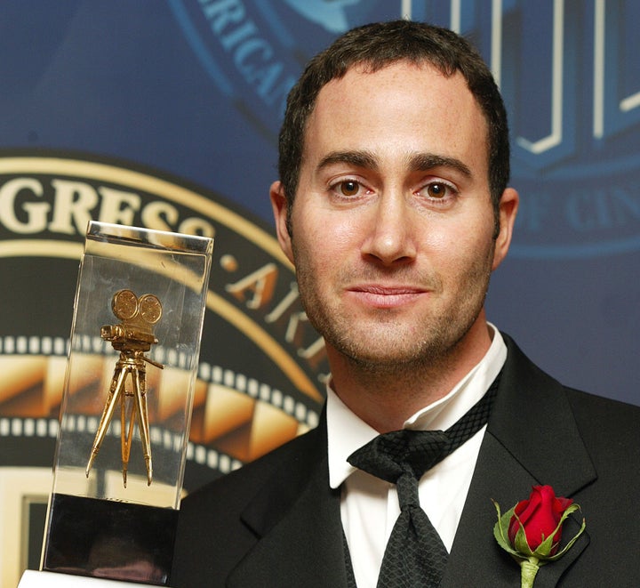 Michael Barrett receives an award for cinematography in 2003.