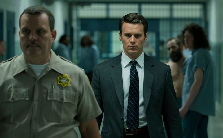 Jonathan Groff, as Holden Ford, appears in a prison to interview a serial killer.