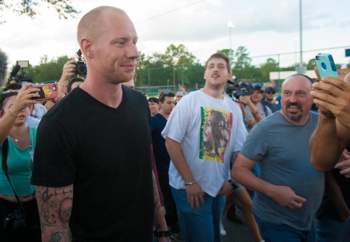 Tyler Tenbrink is photographed during protests.