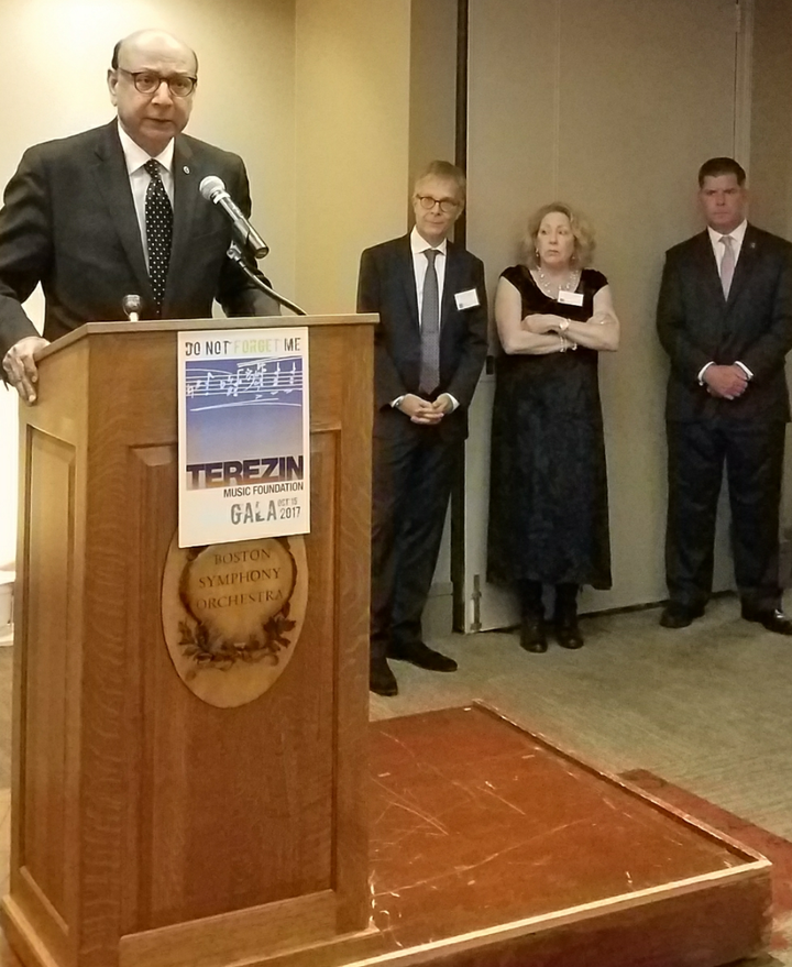 <p>(l to r) Mark Ludwig of the Terezín Music Foundation; Cynthia Curme, Benefit Committee Co-Chair; and Boston mayor Marty Walsh listen to Khizr Khan speak.</p>