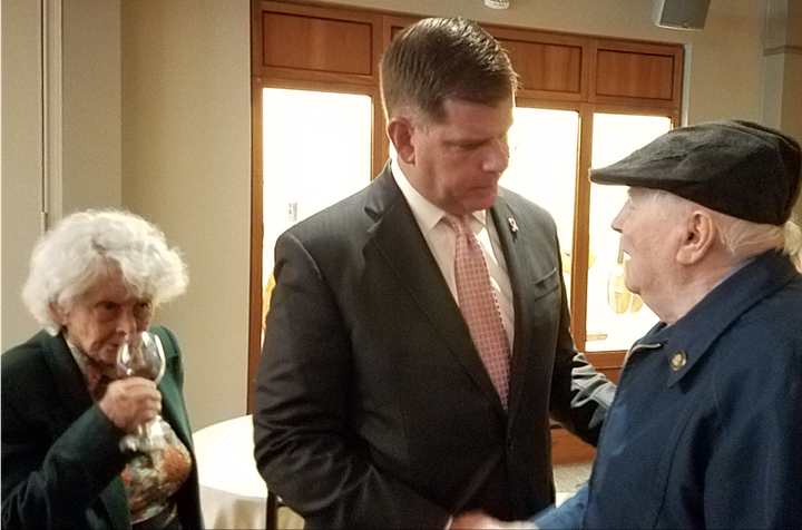 <p>Boston Mayor Marty Walsh speaks with Holocaust survivors Margot Segall-Blank and Sam Weinreb.</p>