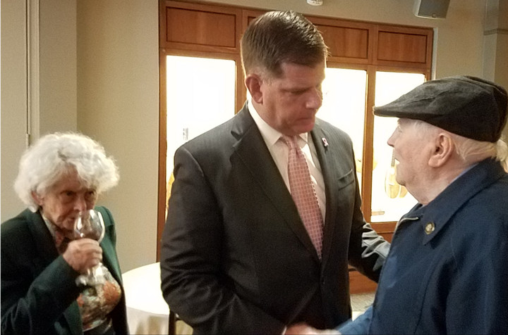 Boston Mayor Marty Walsh speaks with Holocaust survivors Margot Segall-Blank and Sam Weinreb.