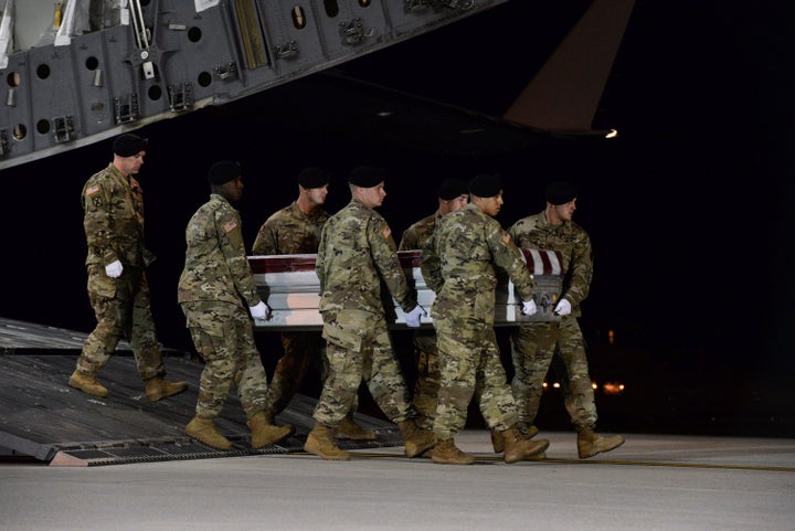 A U.S. Army carry team transfers the remains of Army Staff Sgt. Dustin Wright of Lyons, Georgia, at Dover Air Force Base in Delaware, U.S. on October 5, 2017. 