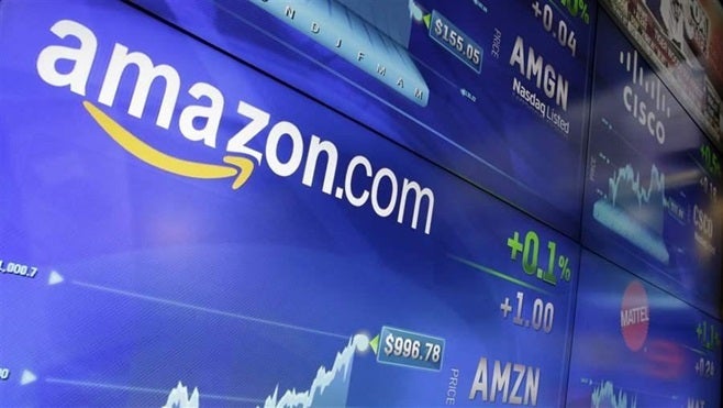 The Amazon logo is displayed at the Nasdaq MarketSite in New York. Amazon is seeking a site for a second headquarters, and many cities and states hope to attract it.