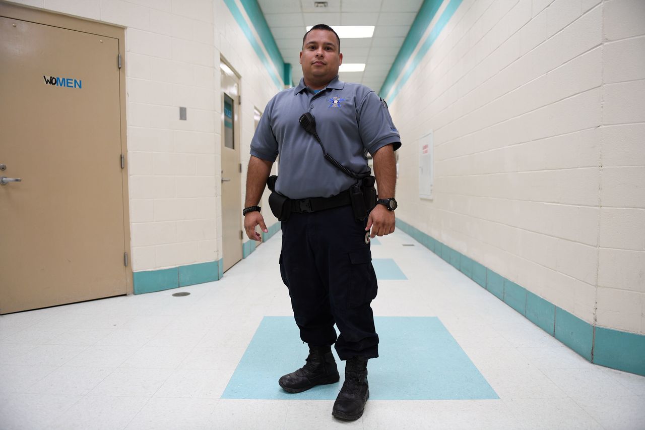 Jonathan Duran returned to work as a jailer at the Ector County Detention Center in Odessa. It's a steadier job than oil field work.