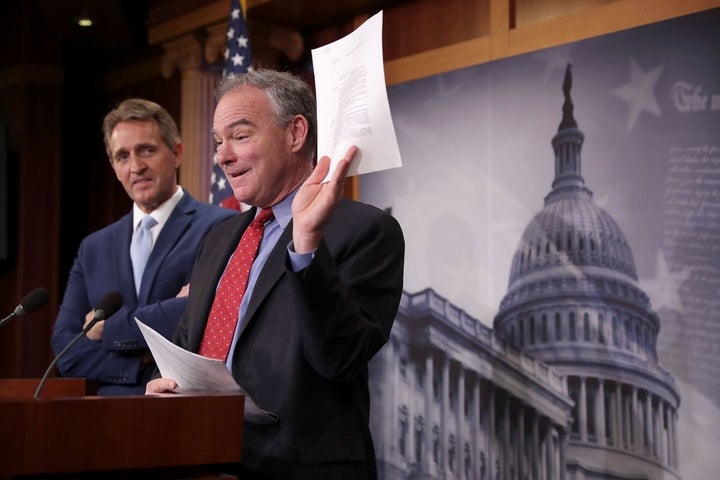 Sen Jeff Flake and Sen Tim Kaine talk about their introduction of a new Authorization for the Use of Military Force against the Islamic State group al-Qaida and the Taliban in May.