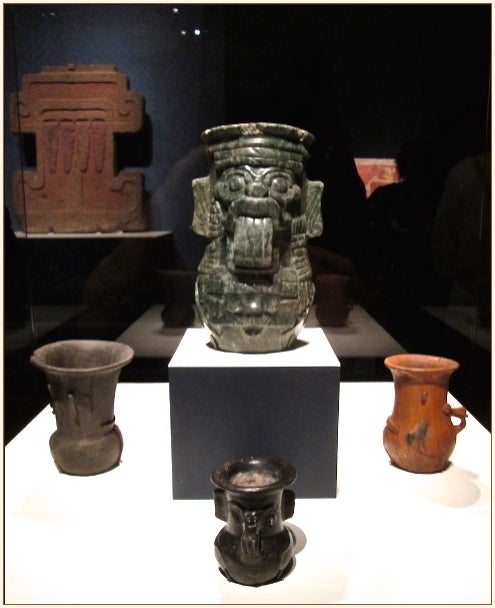 Storm God vessels and Storm God relief in background.
