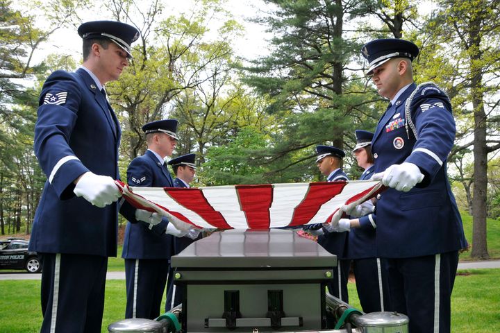 A military honor guard perform a seven-member funeral detail at a cemetery in Massachusetts in 2012.