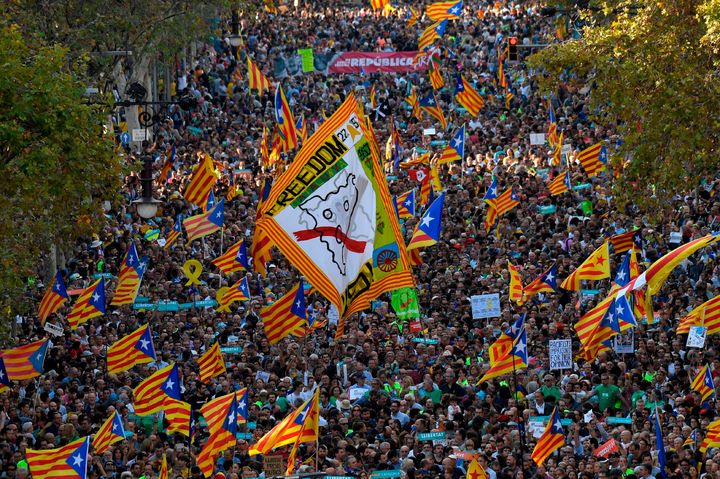 Pro-independence Catalan Esteladas flags during a demonstration in Barcelona after Rajoy's statement