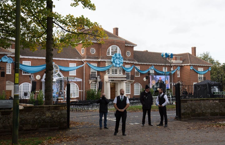 The new Church of Scientology HQ pictured here guarded by security