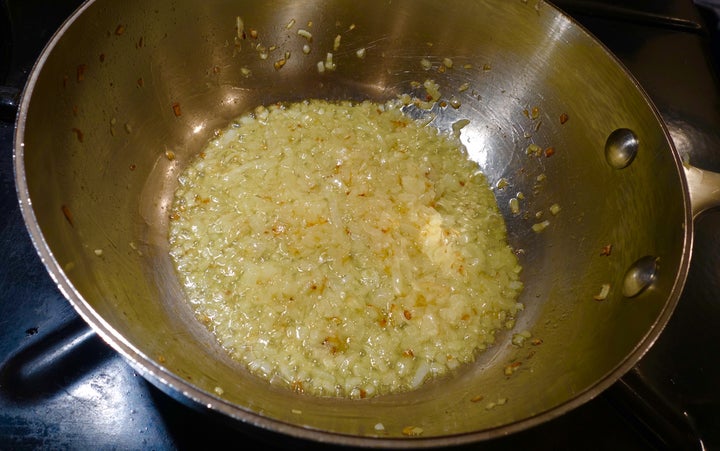 Cook the finely chopped onion until turning golden