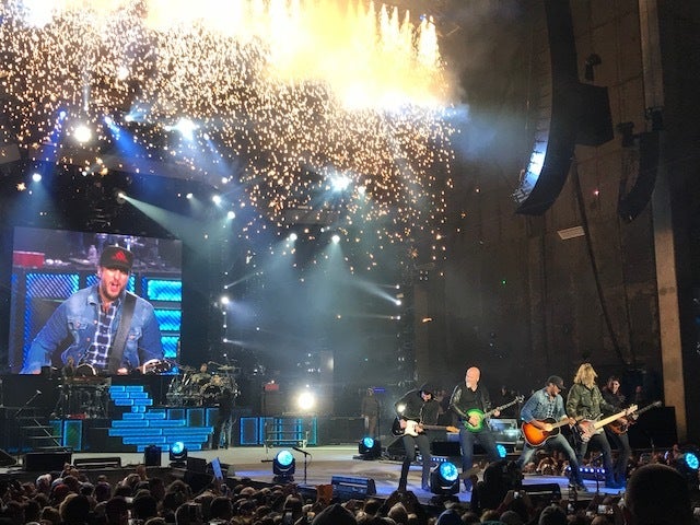 Luke Bryan singing “All My Friends Say”