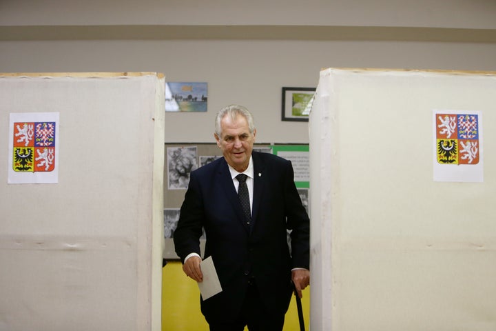 Czech President Milos Zeman casts his vote in parliamentary elections at a polling station in Prague on Oct. 20, 2017.