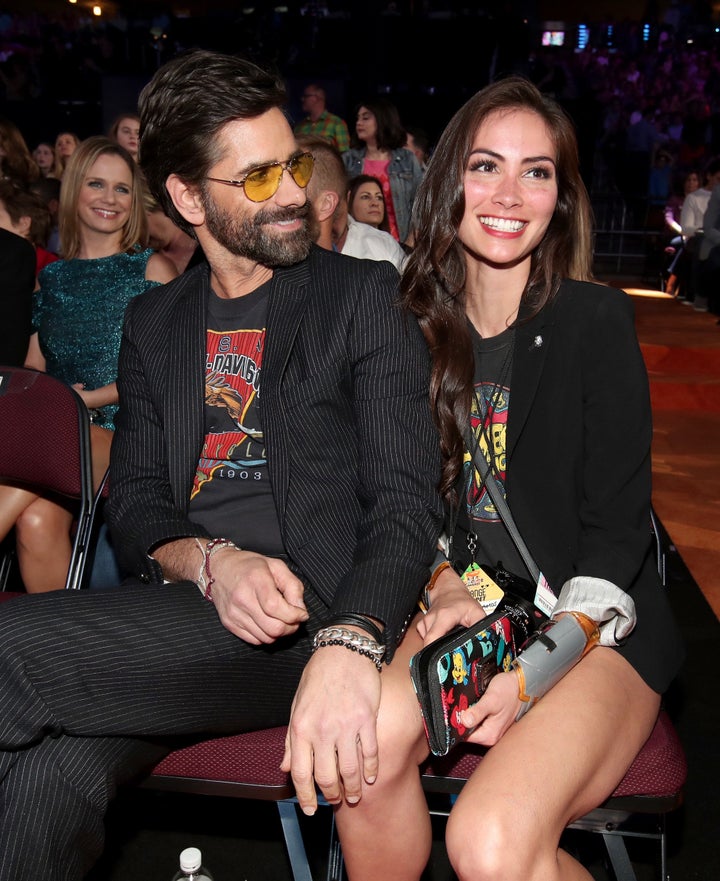 John Stamos and Caitlin McHugh at Nickelodeon's 2017 Kids' Choice Awards at USC Galen Center on March 11, 2017 in Los Angeles.