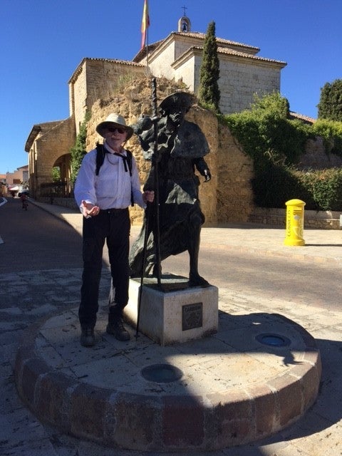 <p>This pilgrim and patient, next to a statue of St. Jacques</p>