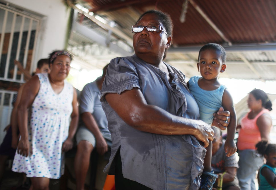 Americans in San Isidro, Puerto Rico, wait for FEMA to arrive with water. Their neighborhood has been without&