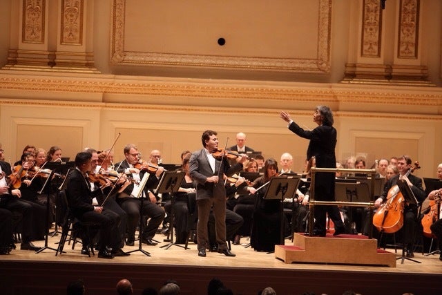 Violinist Maxim Vengerov with Kent Nagano conducting the Orchestre symphonique de Montréal in concert at Carnegie Hall.