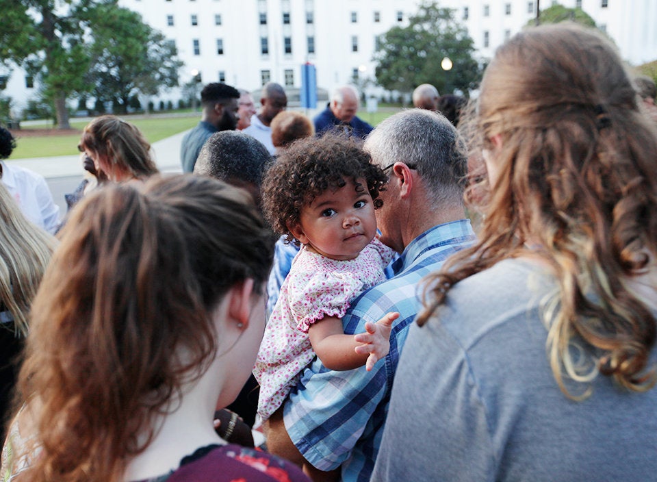 Congregants pray together at a joint church service in Montgomery, Alabama, in October.