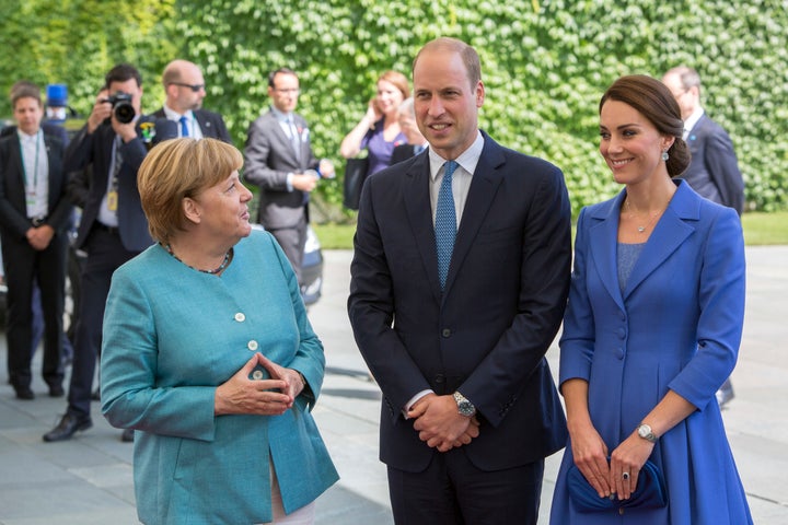 German Chancellor Angela Merkel welcomes Prince William, Duke of Cambridge and Catherine, the Duchess of Cambridge in the German Chancellery in Berlin on July 19.
