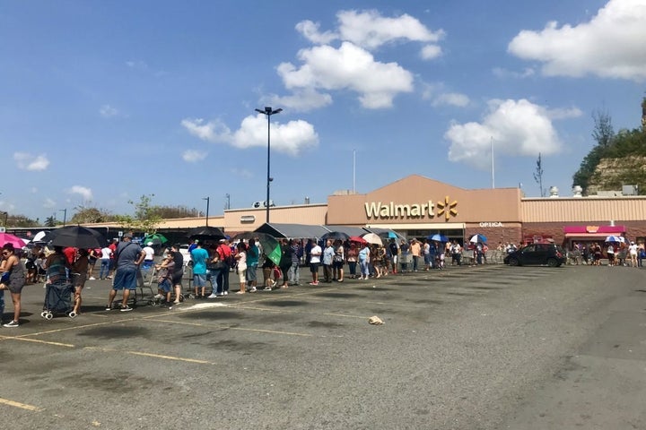 Hundreds of people wait in line for hours at the Walmart in Bayamon Puerto Rico on Oct 8, 2017.