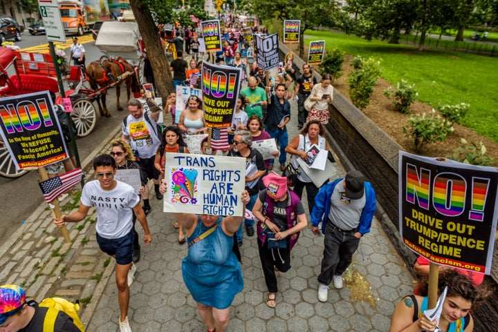 Protesters gather at Columbus Circle on July 29 to protest Trump's transgender military ban.