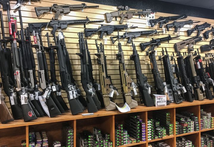 Semi-automatic rifles are seen for sale in a gun shop in Las Vegas, Nevada on October 4, 2017.