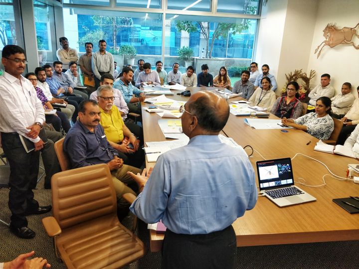 <p>The Chairman Mr.Vijay Wadhwa addressing the employees on the importance of leadership, ownership and accountability</p>