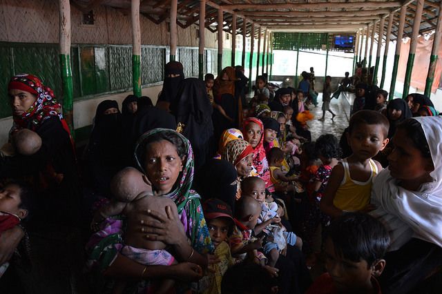 Photo taken on May 19, 2013, in Bangladesh, at a European Commission funded clinic that serves both the refugees and the local villages. In the photo, women from both communities await their turn for a consultation.