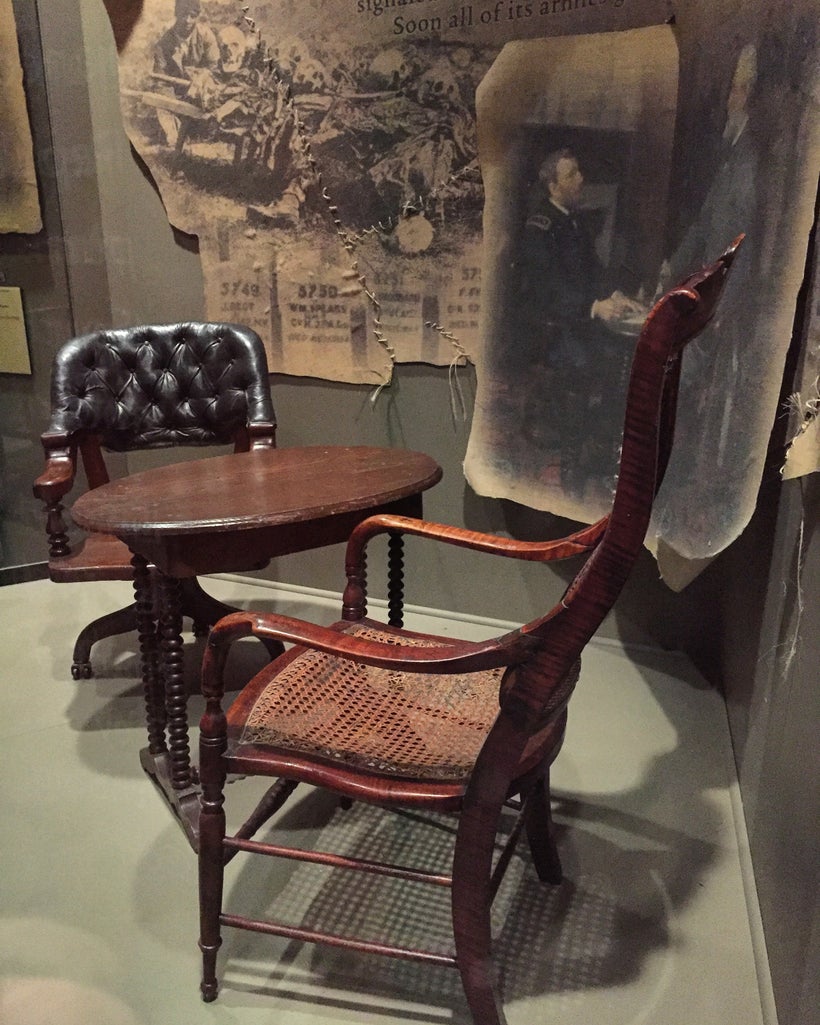 Grant sat in the black leather chair and used this table. Lee sat in the wicker chair. Both chairs and tables were seized a