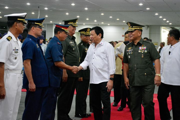 President Duterte and security officials in Davao City