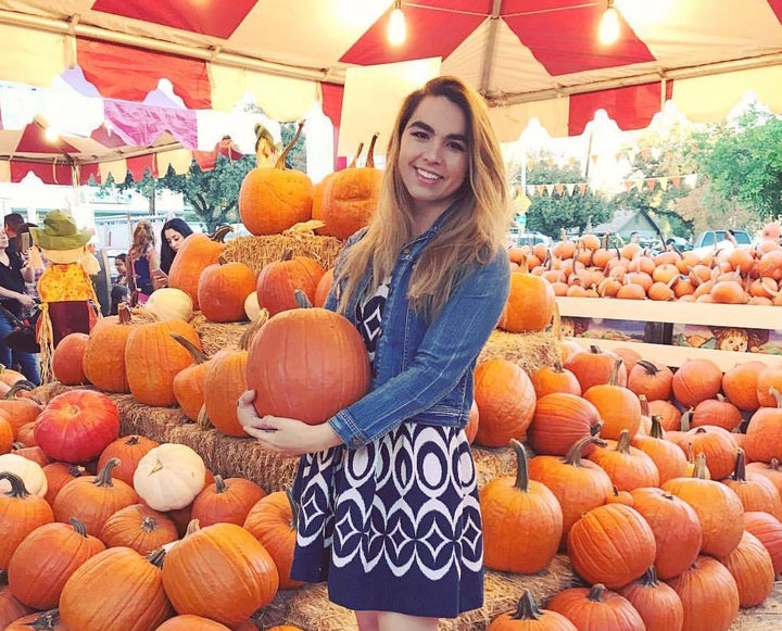<p>Present day me, searching for the perfect pumpkin at the Pasadena Pumpkin Patch</p>