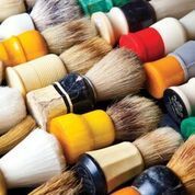 A bright compilation of vintage shaving brushes.