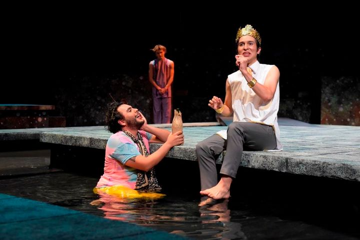  Drunken Silenus (Ivan A. Oyarzabal) regales King Midas (Alexander Espinosa Pieb) with a tale of immortality in a scene from Metamorphoses