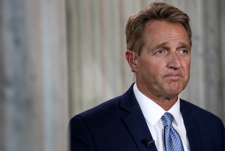 Sen. Jeff Flake (R-Ariz.) looking sad, after he announced he's not running for re-election. He said he's bowing out because he can no longer be "complicit" with what President Donald Trump is doing to the country.