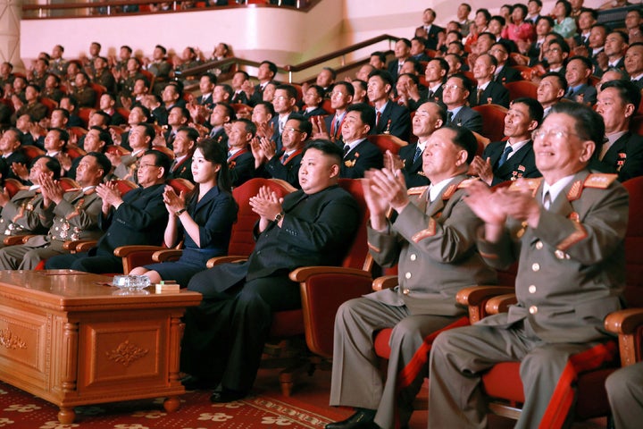 An undated photo of North Korean leader Kim Jong Un (center), released by North Korea's official Korean Central New