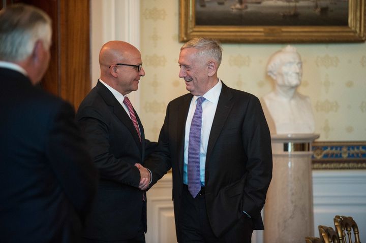 U.S. Defense Secretary Jim Mattis, at right, shakes hands with national security adviser H.R. McMaster.