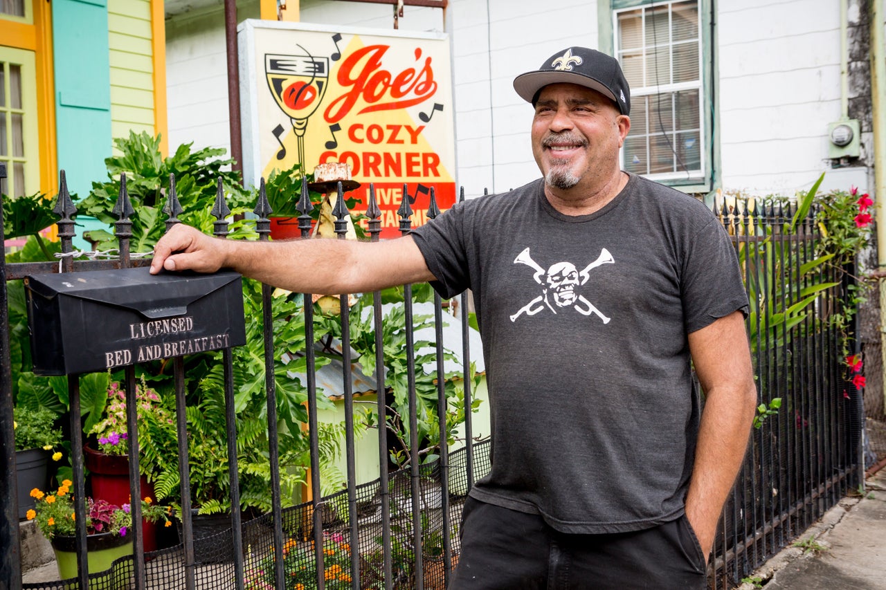 Alton Osborn stands outside his home in the Bywater neighborhood.