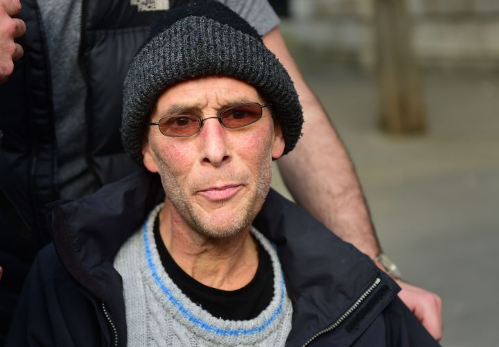 Anthony Brett outside St Bartholomew's Hospital in London in May. He was about to have a stent put in his liver to treat his cancer when he was told the procedure could not happen due to the cyber attack