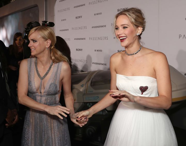 Anna Faris and Jennifer Lawrence attend the premiere of 'Passengers' in December 2016.