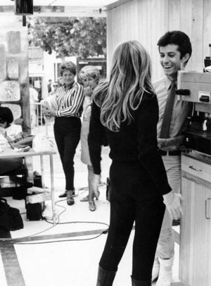 George Chakiris, Francoise Dorleac between takes on “Rochefort.”
