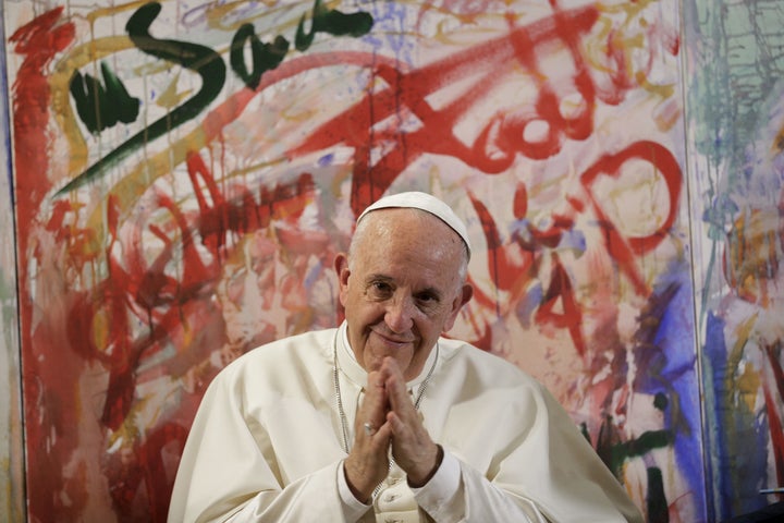 Pope Francis gestures as he attends a meeting with members of the Scholas Occurrentes initiative, in Palazzo San Calisto in Rome on October 26, 2017.